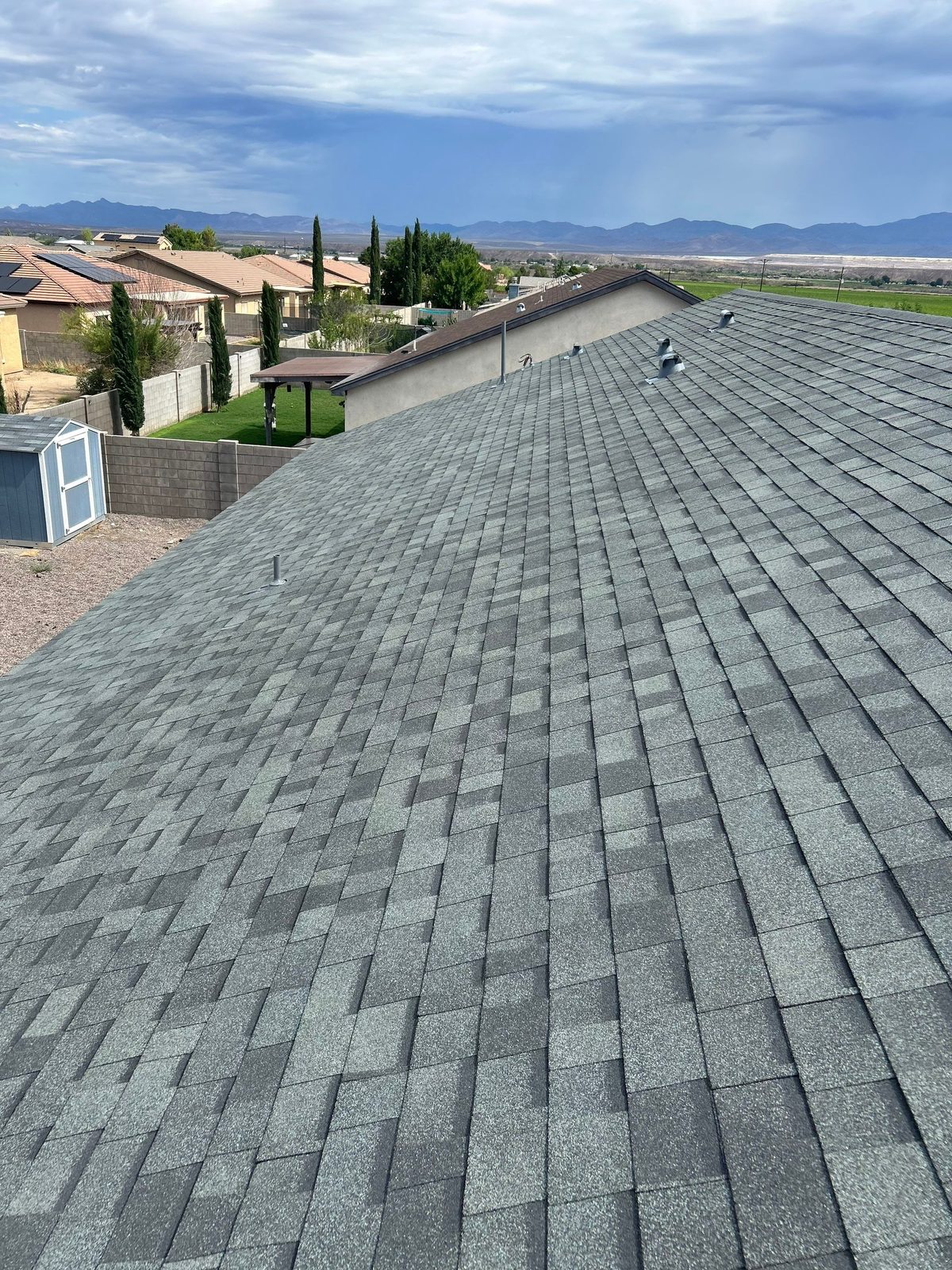 Grey architectural shingle roof plane on a home in Thatcher, Arizona