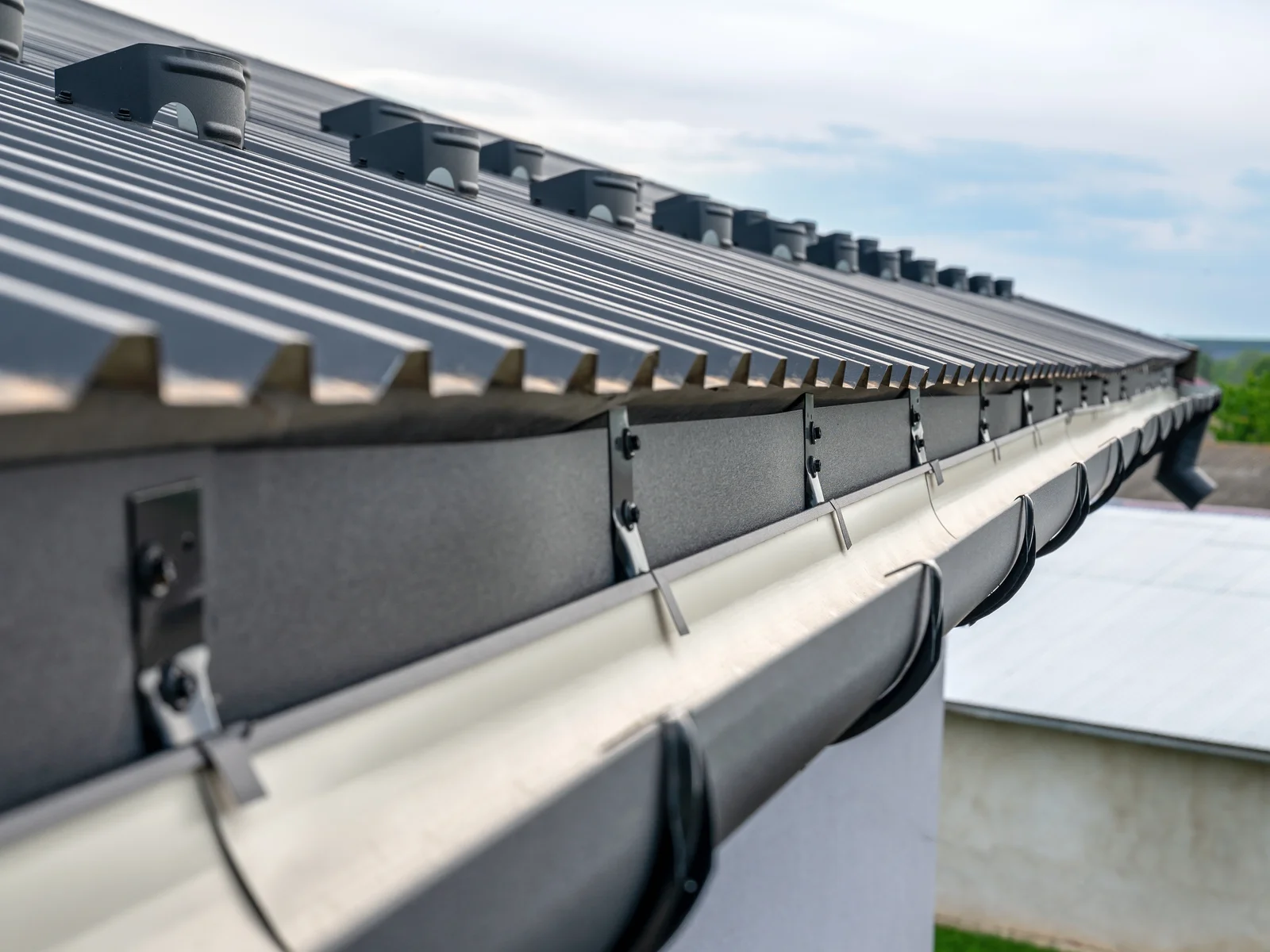 Seamless gutter installation by Big Buckle Roofing