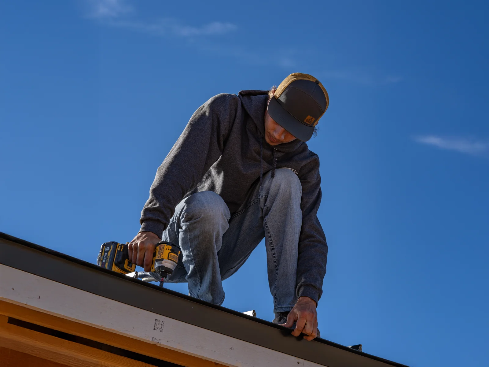 Big Buckle crew repairing a roof
